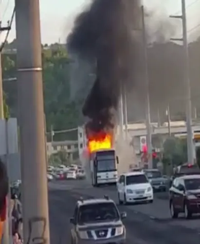 Bus ablaze in Harmon