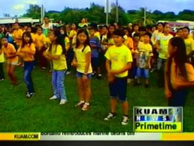 Dededo students collect funds for Japan