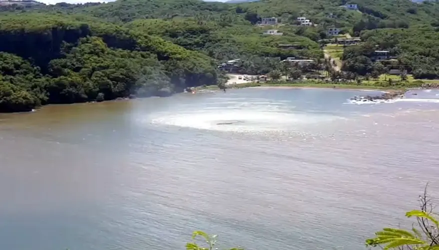 Navy rescue chopper aides distressed swimmer at Talofofo Bay