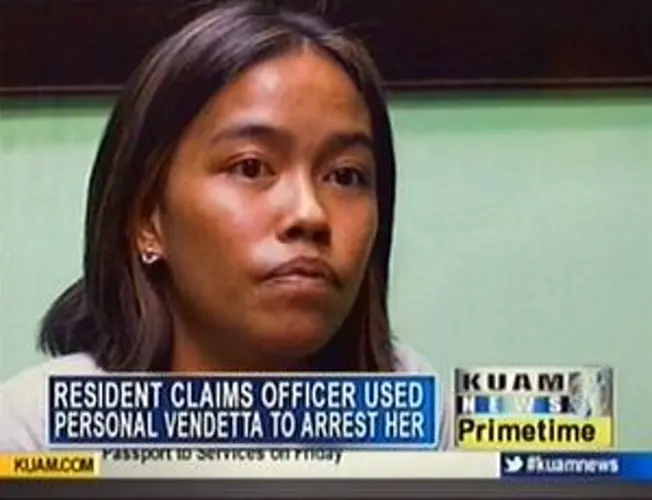 Agat woman says cop has vendetta against her