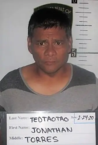 Burglar gave police a fake name and then lifted his shirt to reveal 'Tedtaotao' tattoo