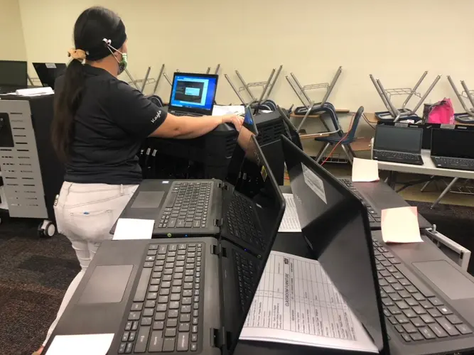 JFK to begin laptop distribution