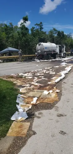 Diesel fuel spilled onto road in Piti