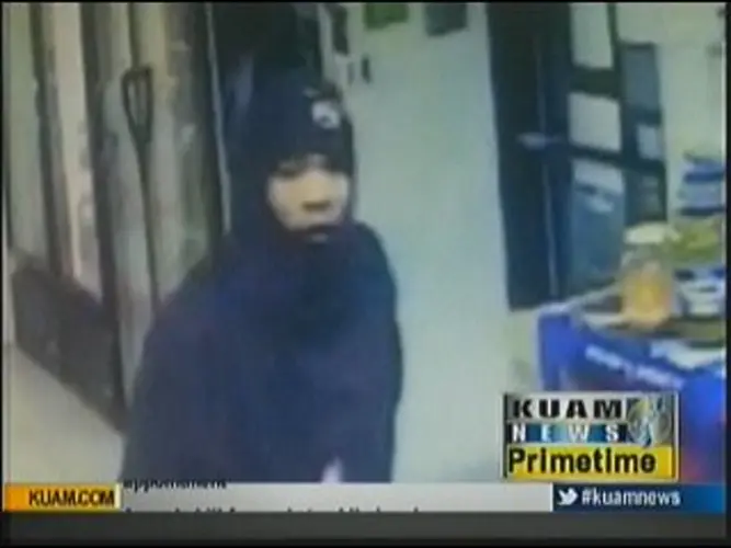 Armed robber caught on camera hitting Barrigada store