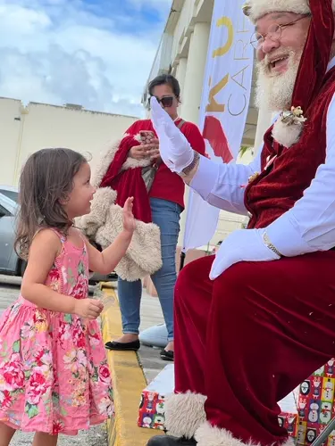 Santa greets happy kids at KUAM!