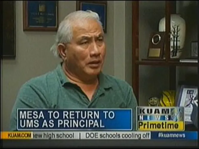 Fired two years ago, former principal gets job back...with backpay