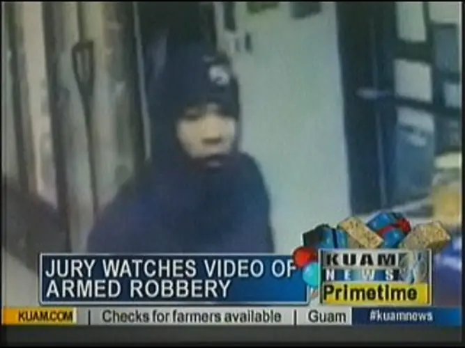 Jury watches video of armed robbery