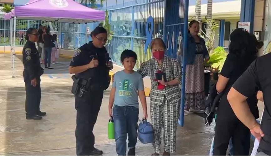 All clear: Families relieved after police sweep school  campus following suspicious note
