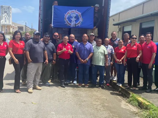 Two containers filled with supplies turned over by CNMI officials