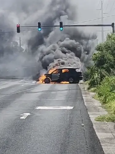 Four injured in crash that involved port police officer, car catches fire