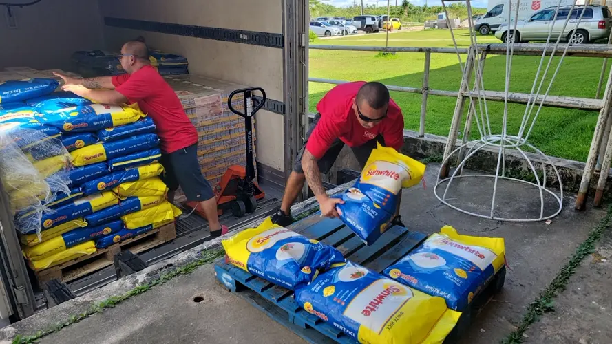 Quality distributors makes annual Thanksgiving donation to Salvation Army