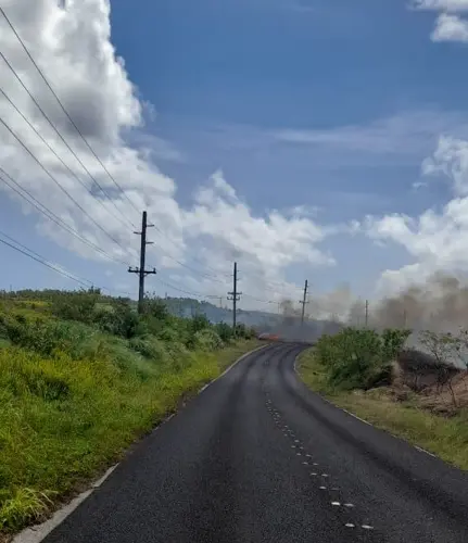Grass fires forces road closure in Windward Hills