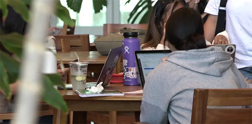 Students on Biden's student loan forgiveness, “Biba student debt relief!"