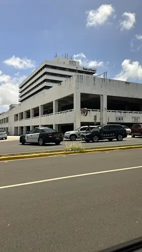 Guam police respond to a bomb threat at ITC building