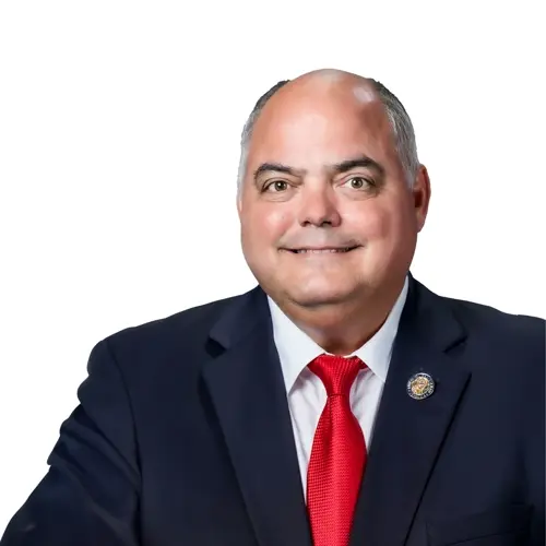 CHRISTOPHER M. DUENAS