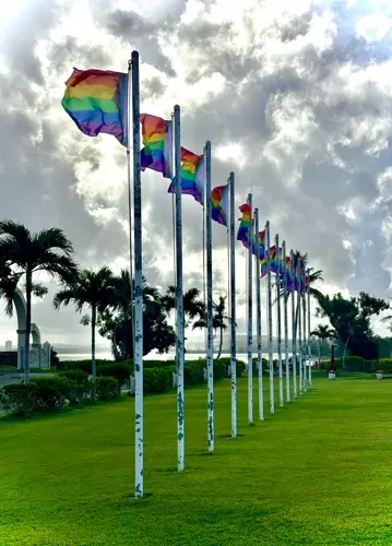 Progressive pride flags donated, raised at Adelup
