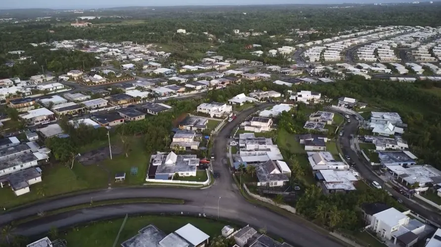 What impacts does Trump's tariff tactic have on Guam's housing market?