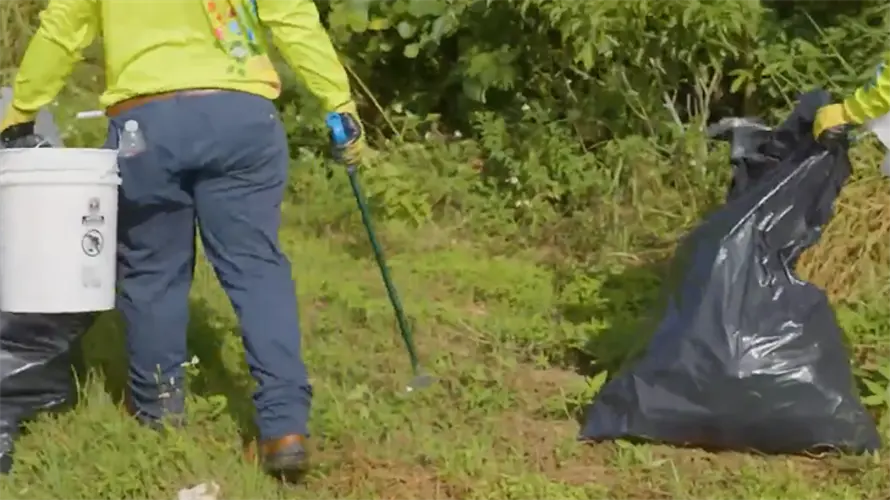 UOG distributing free can bins, recycling support at Liberation Parade