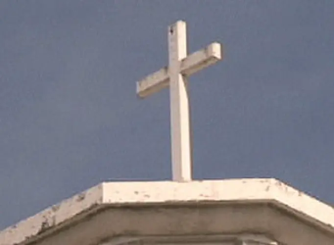 Is there a schism in Guam's Catholic church?