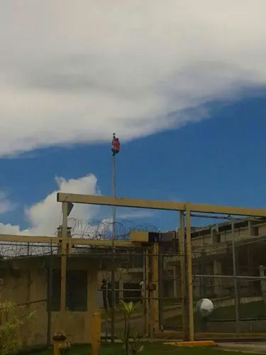 Inmate caught climbing flagpole at prison