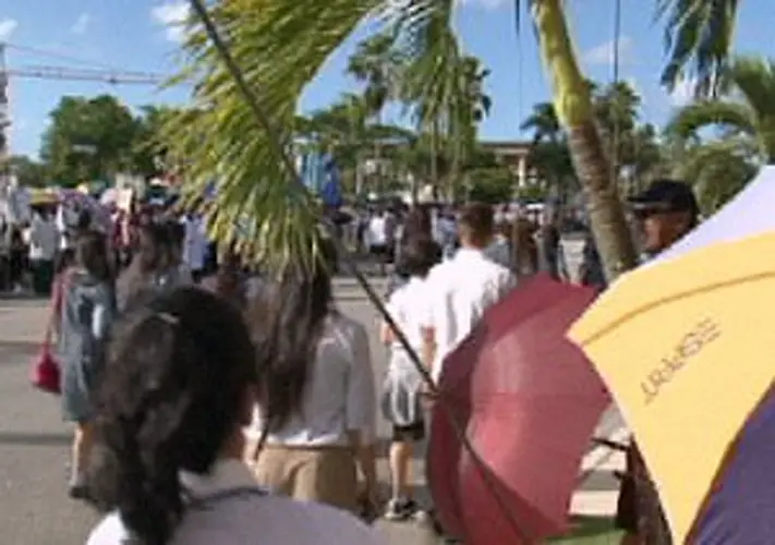 Generations of Guamanians participate in procession