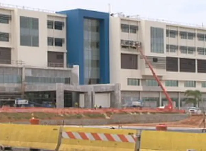 Calvo signs qualifying certificate for new hospital