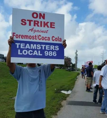 Foremost/Coke staffers protest proposed wage cuts