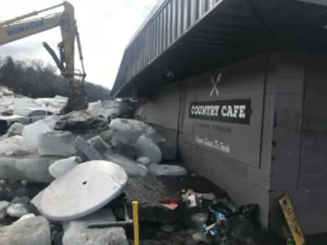 Propelled by ferocious floodwaters, huge ice chunks batter buildings in Niobrara