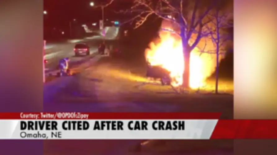 Crashed car goes up in flames, driver cited for DUI