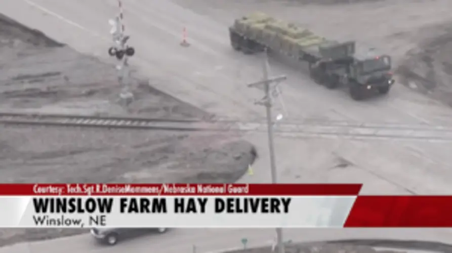 The National Guard helps with hay delivery to a Winslow farm