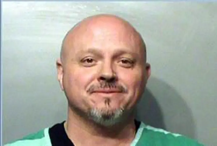Lawyer's son arrested in midst of ex-Iowa governor's trial