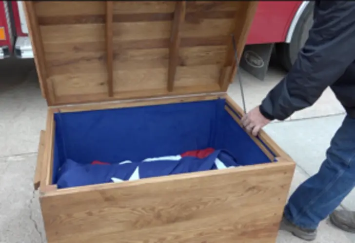 Fairbury Rural Fire Department receives donated, hand made box to store their American Flag in