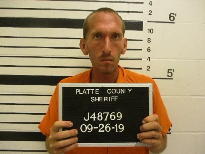 Case pushed back for man accused of ramming truck into several vehicles, store front