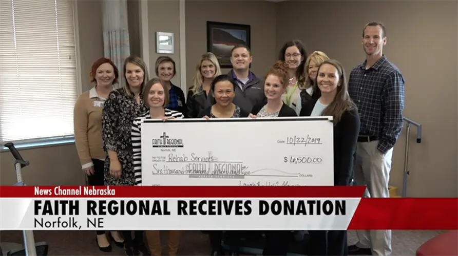 Faith Regional Health Services receives donation from Laugh and a Half Marathon