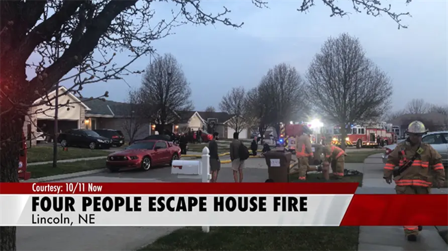 Four people safely escape from house fire in north Lincoln