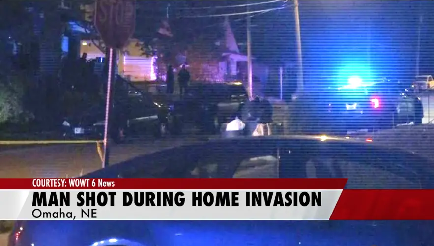 Police search for suspects after two hurt in home invasion and shooting