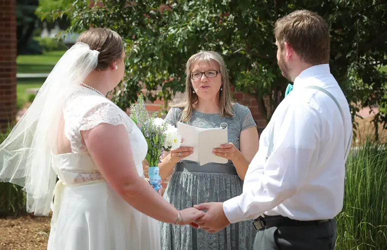Perfect chemistry: Couple ties the knot at UNK, where they met three years ago
