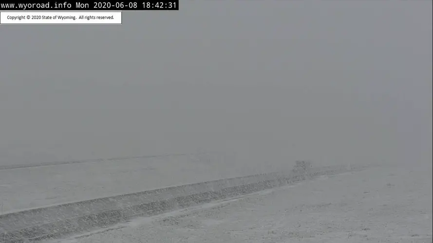 Spring snowstorm closes interstate, cuts power in Wyoming