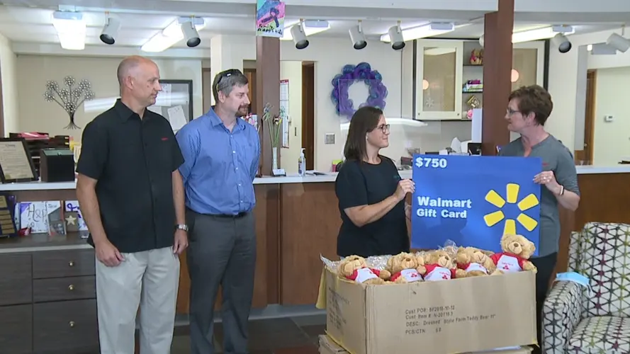 Columbus State Farm agents make donation to Center for Survivors