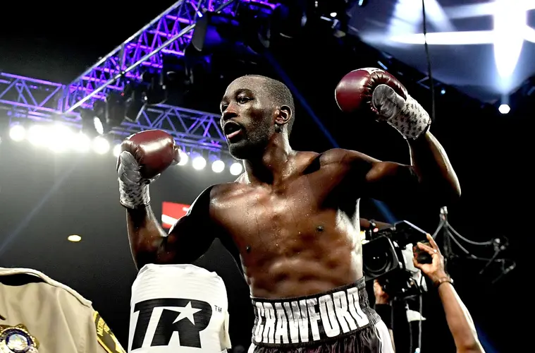 Crawford tops Brook in 4th in welterweight title fight