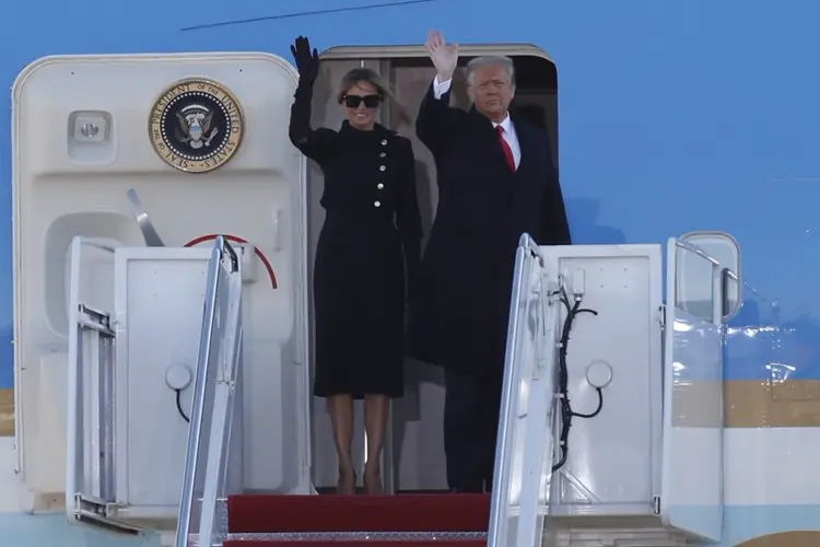Trump bids farewell to Washington, hints of comeback