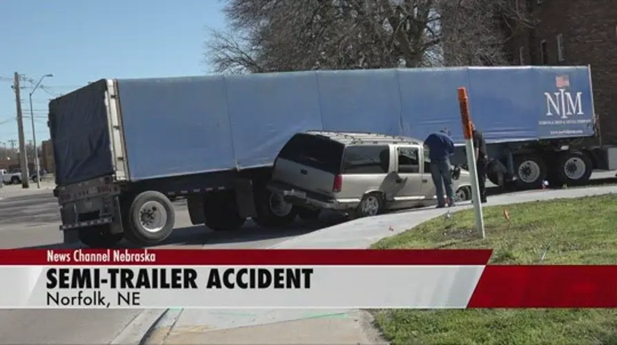 No one injured in Norfolk crash involving semi and SUV