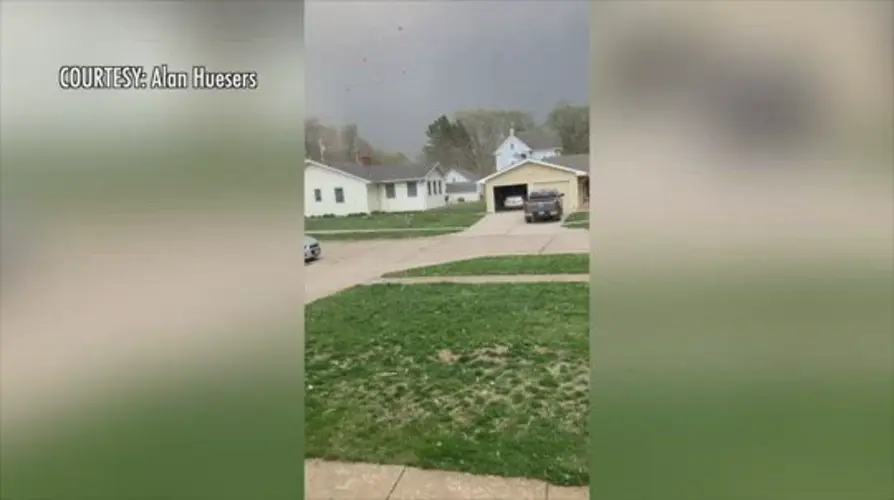 Tornado leaves houses damaged, yards dirty