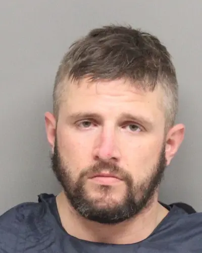 Lincoln man facing charges for drugs and guns in vehicle