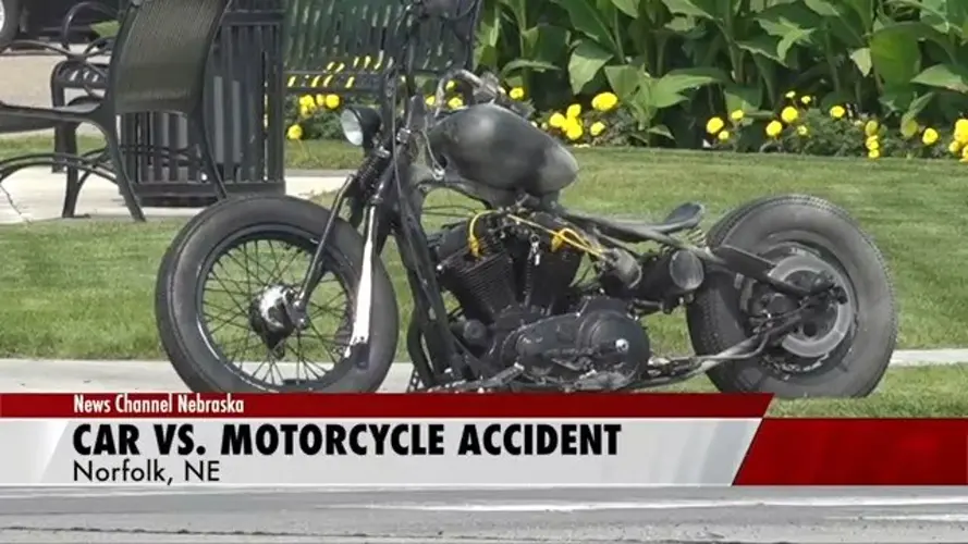 One person hospitalized after car strikes motorcycle