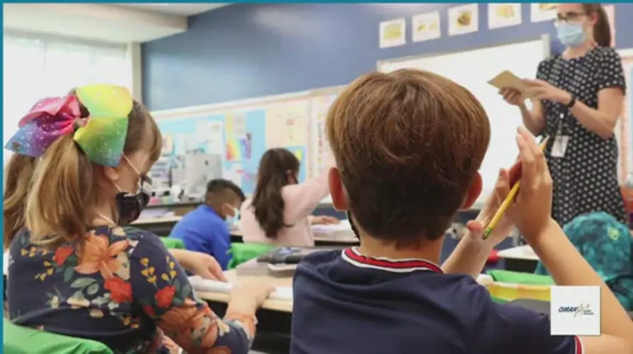 School's ad campaign urging shots for young children