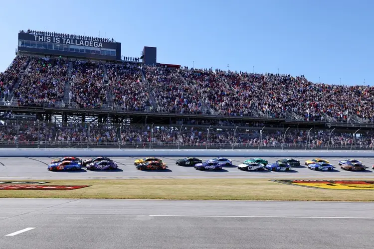 NASCAR race at Talladega stopped after Joey Logano's car goes airborne in scary 15-car wreck