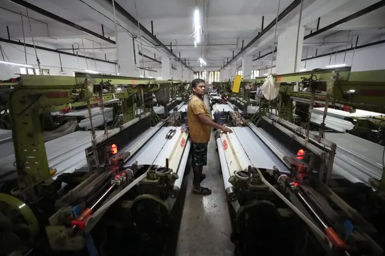 How one Indian textile worker copes with extreme heat in factory work and cramped living quarters