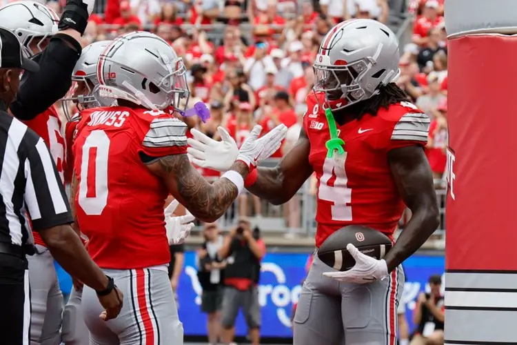 Jeremiah Smith flashes Heisman pose in Ohio State's warmup for showdown with Texas