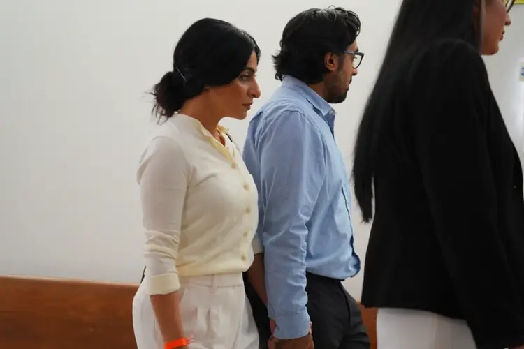 California couple face their surrogate in emotional Texas hearing as dispute over newborn escalates
